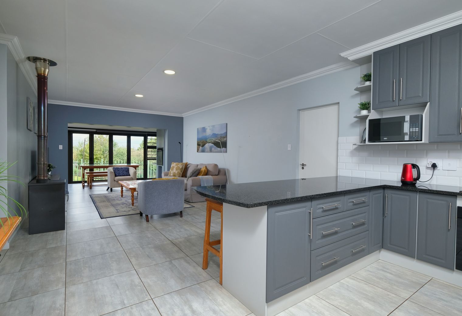 Kitchen Spraying in New Southgate — surfaces prepped and cut in by hand