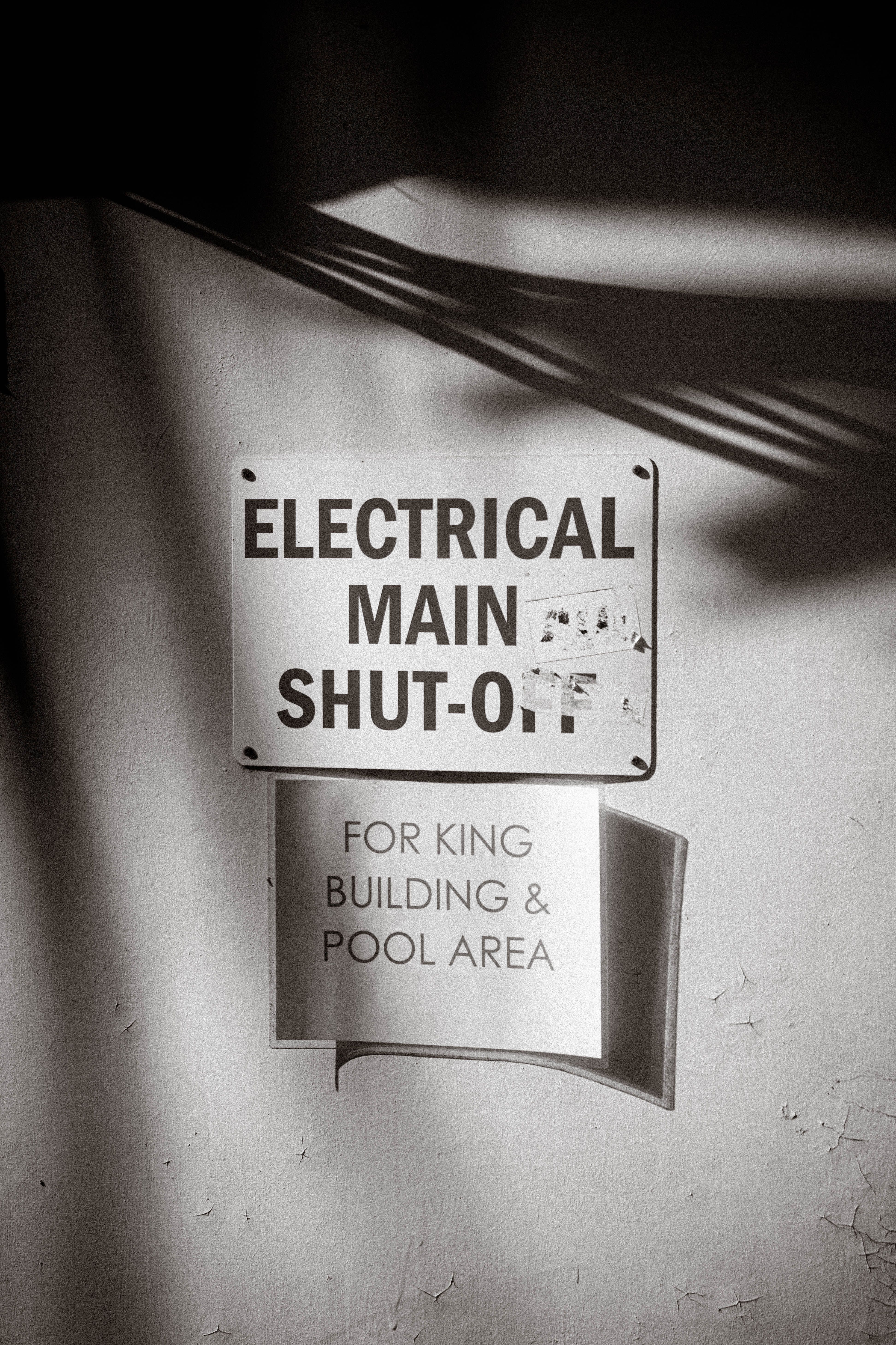 Electrical Main Shut-Off Sign in Monochrome · Free Stock Photo