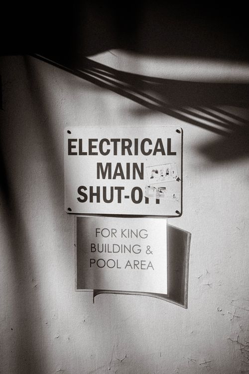 Electrical Main Shut-Off Sign in Monochrome · Free Stock Photo