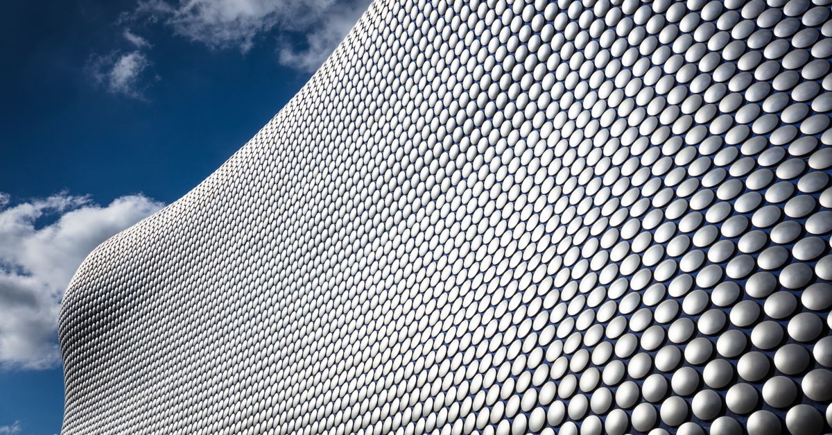 A striking view of the Selfridges building in Birmingham, showcasing its modern architectural design with unique patterns.