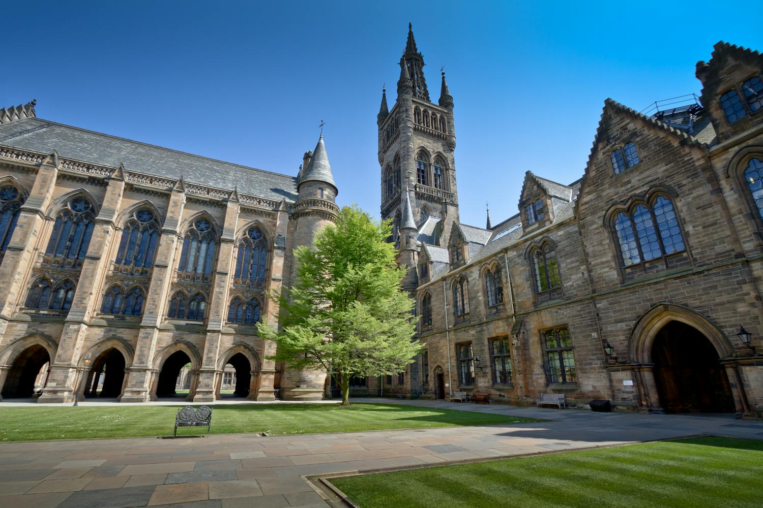 View of stunning historic University courtyard under clear blue sky