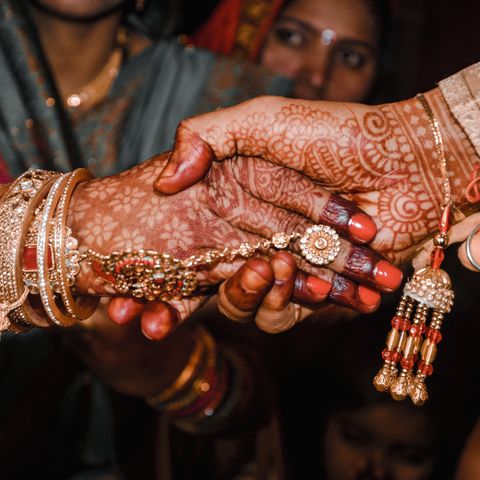 Traditional henna and jewelry at an Indian wedding ceremony