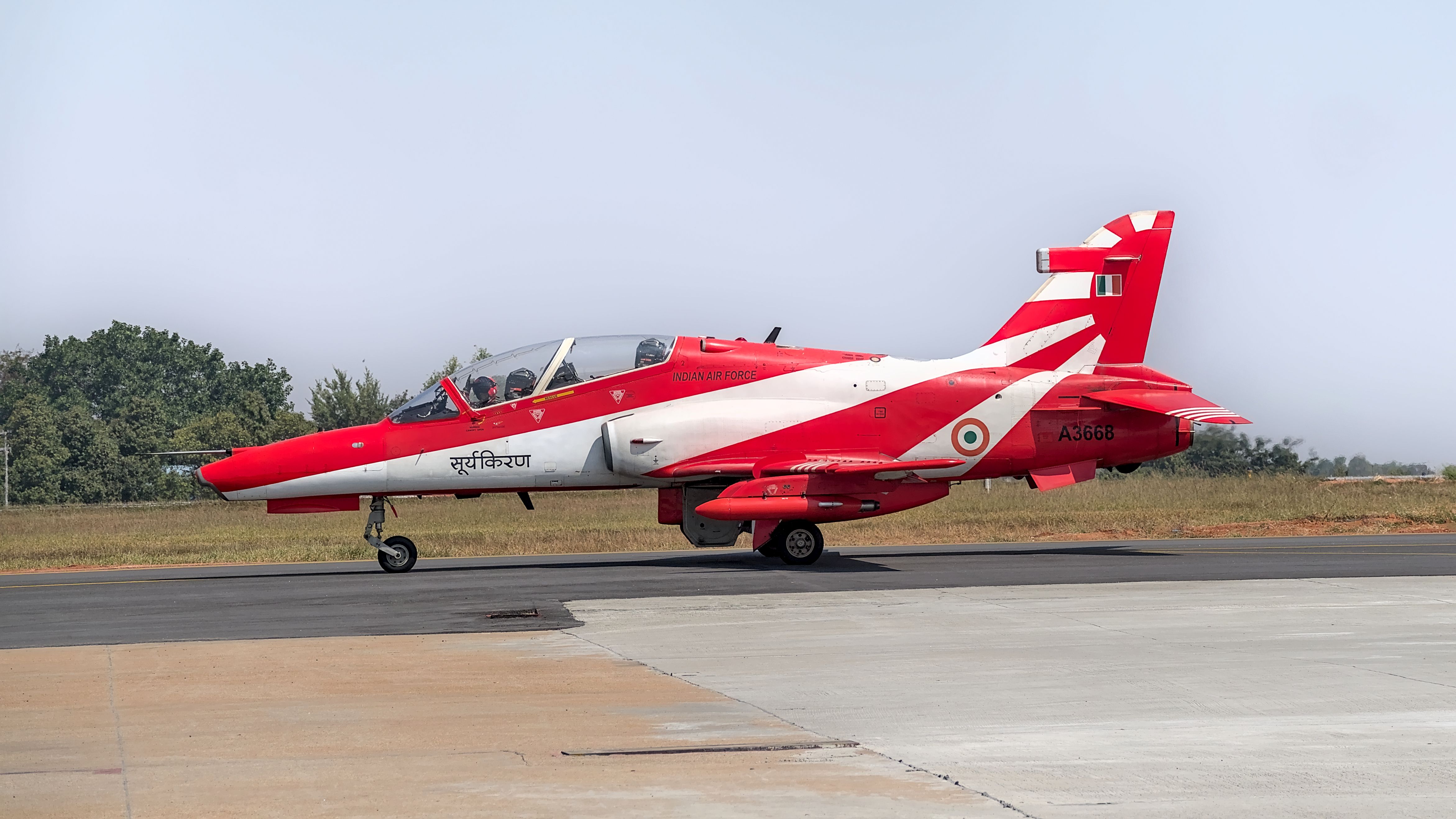 Indian Air Force Surya Kiran aircraft on tarmac in Bengaluru, India.