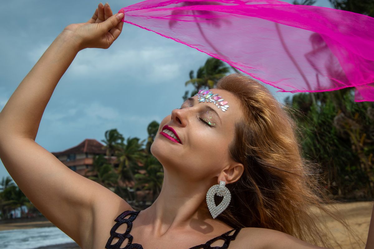 Woman in Pink Dress Posing on Tropical Beach · Free Stock Photo