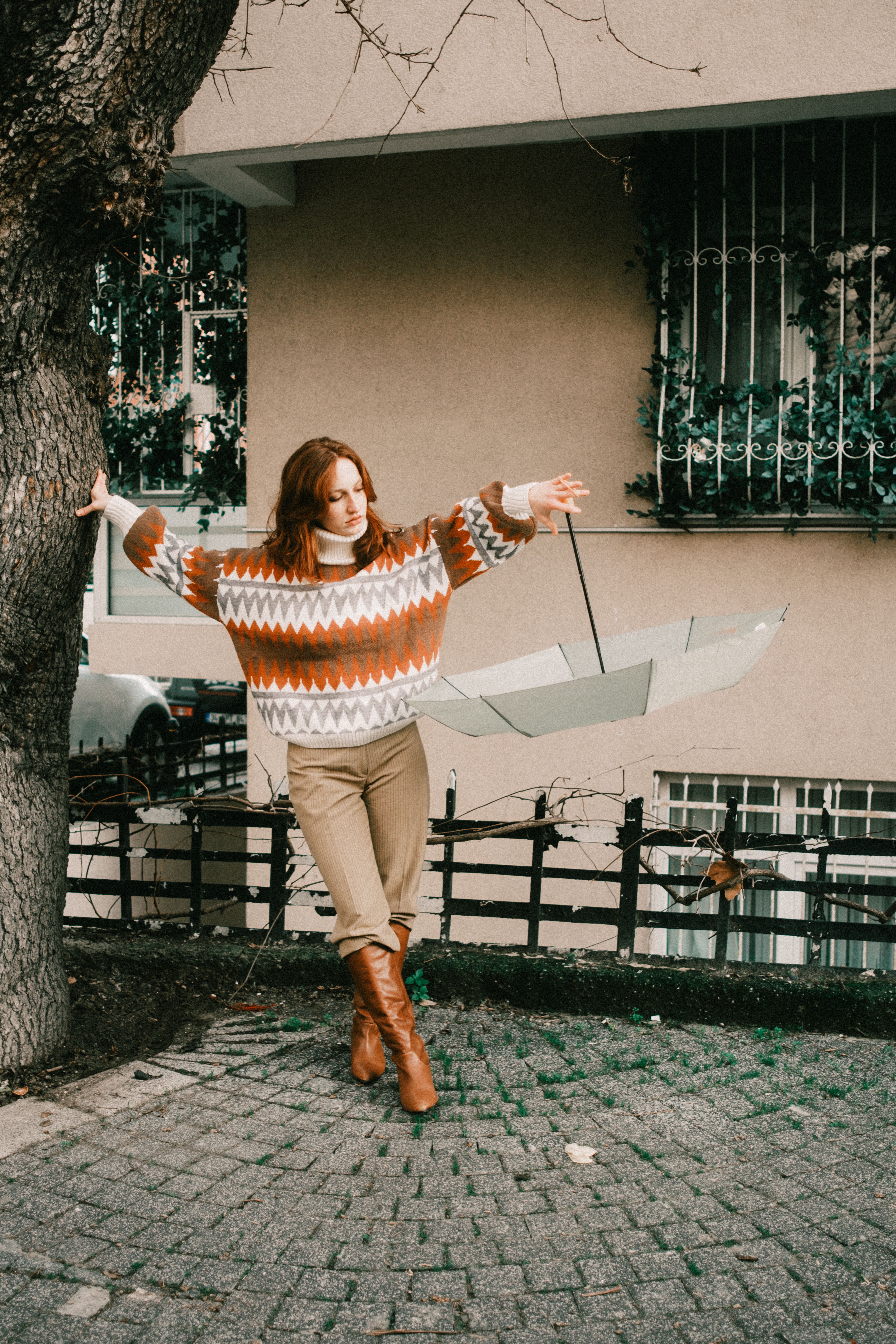 Stylish Woman Posing Outdoors in Autumn Attire · Free Stock Photo