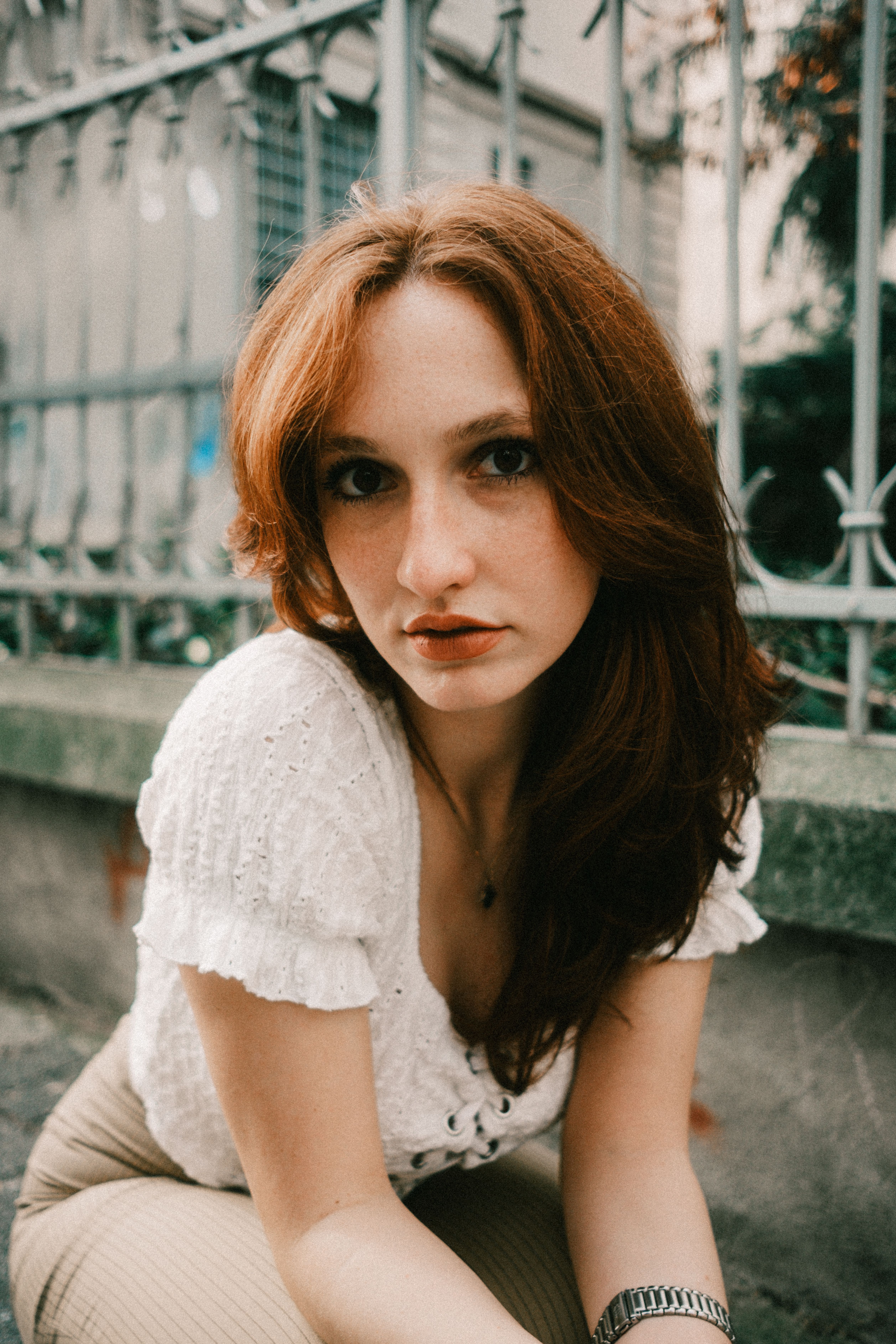 Portrait of a Woman with Red Hair Outdoors · Free Stock Photo