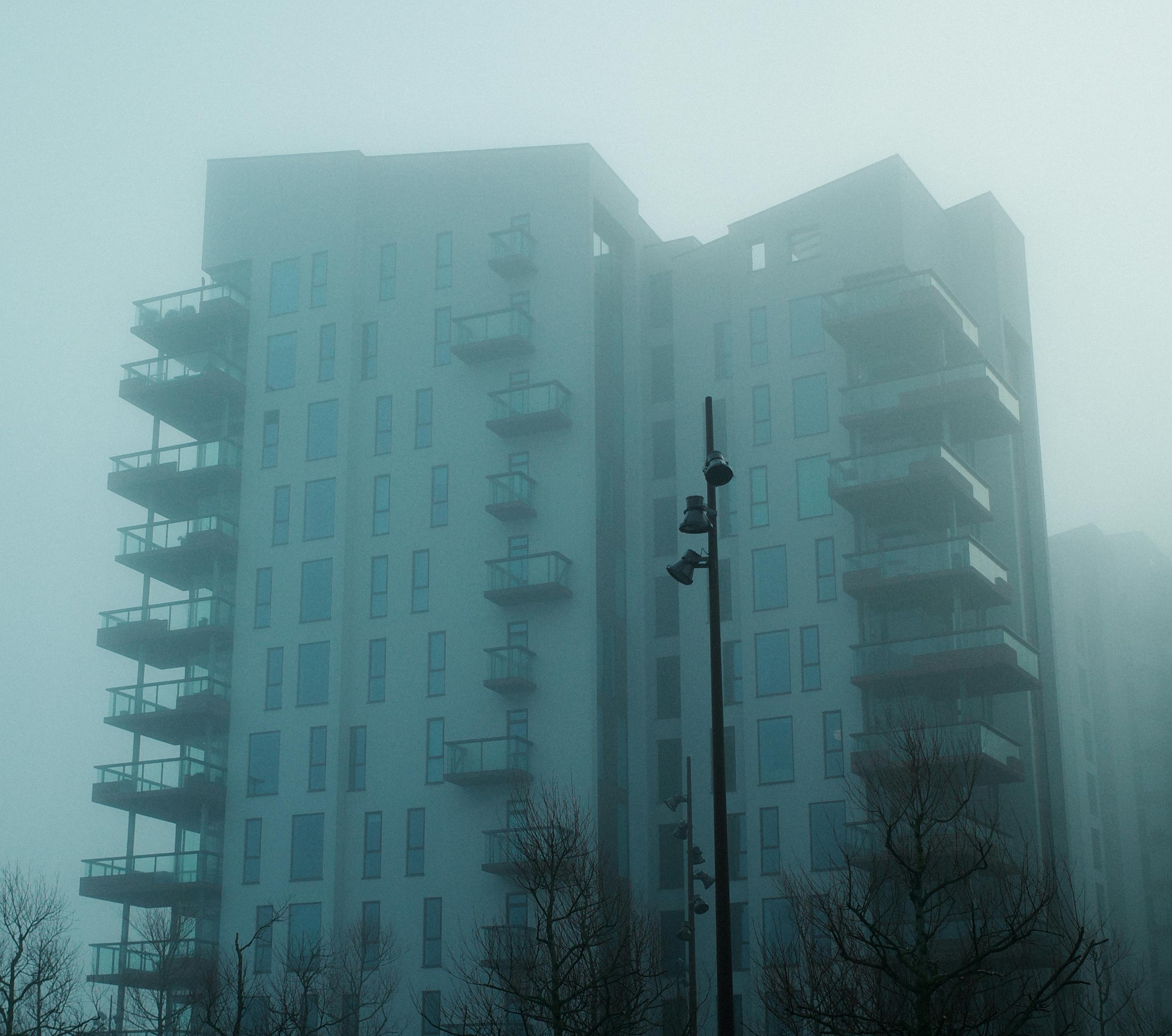 A foggy view of a modern residential building in Aalborg, Denmark.