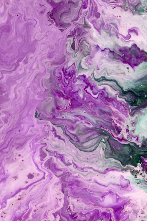 Free Colorful abstract art with swirling purple and green paint patterns. Stock Photo
