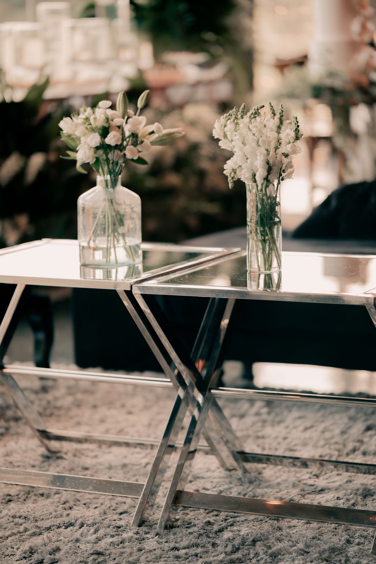Cluster of bud vases with florals