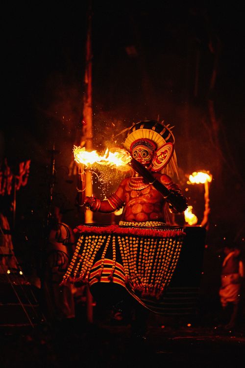 Fire Ritual Costumes Traditional Fire Performance in Vibrant Costume · Free Stock Photo