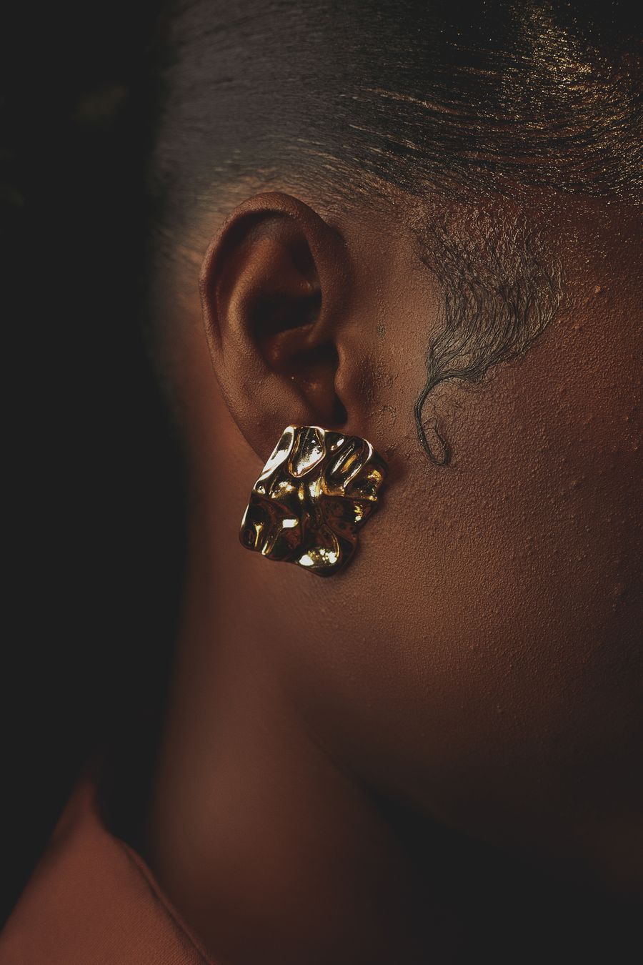Regal statement earring drops in an artificial gold finish
