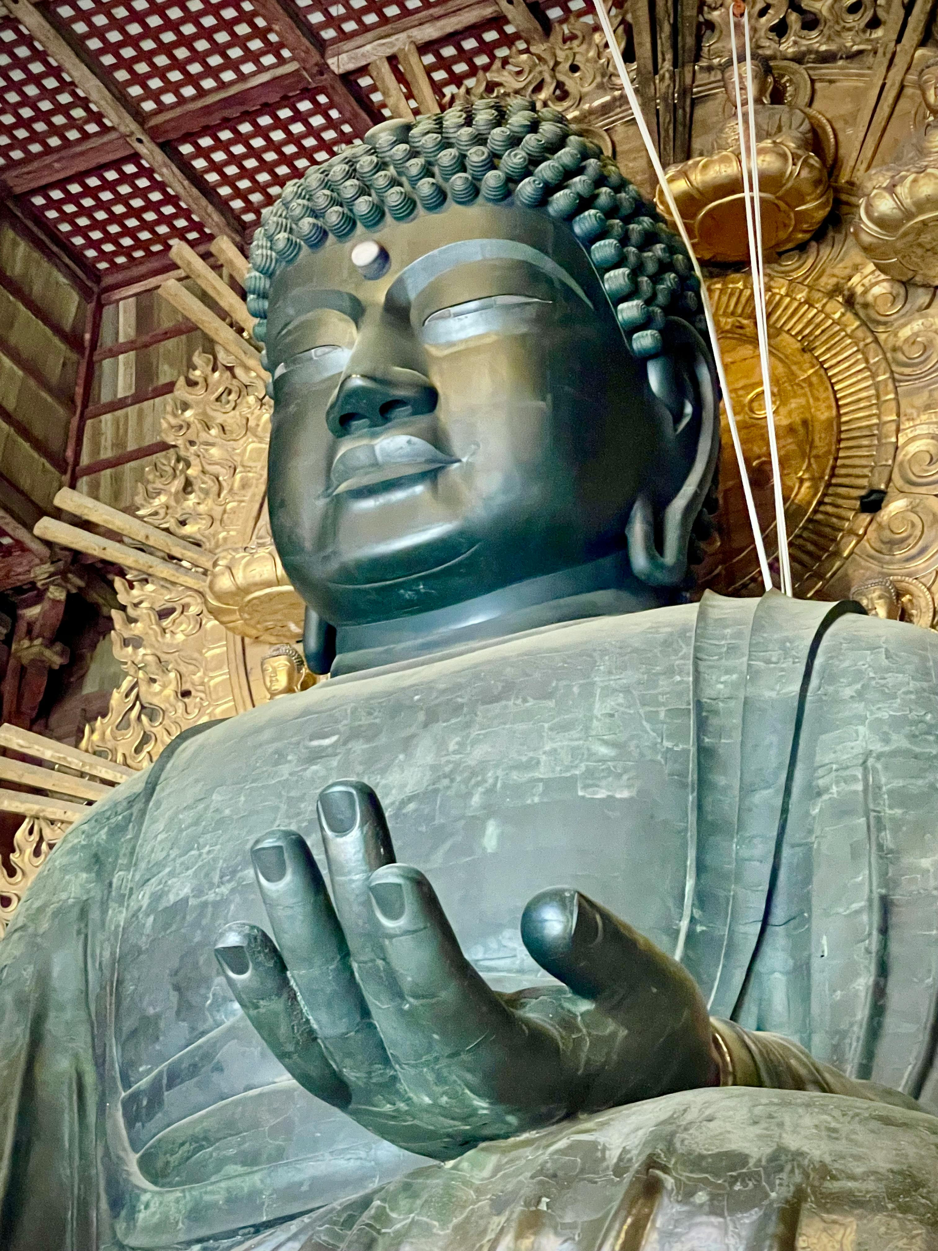Majestic Great Buddha statue in Todai-ji Temple, rich cultural heritage.
