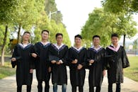 Group of Happy Graduates Celebrating Outdoors