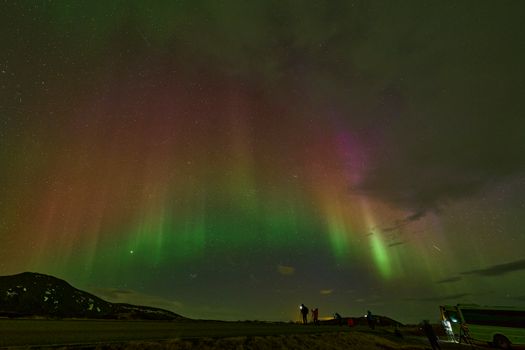 Captivating northern lights over Iceland's Þingeyjarsveit, showcasing vibrant auroras.