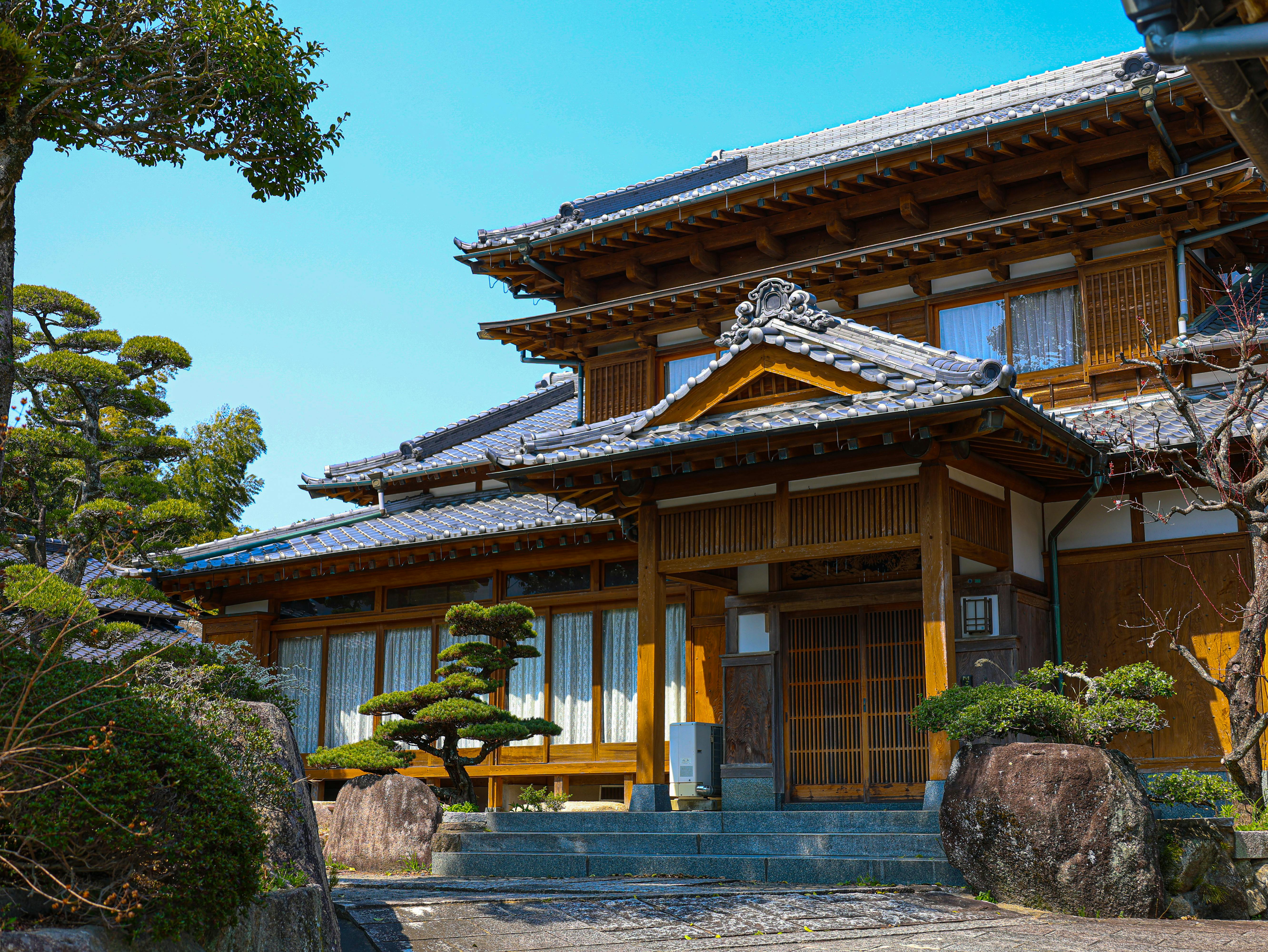 Charming traditional Japanese house with wooden architecture and manicured gardens in Fukuoka, Japan