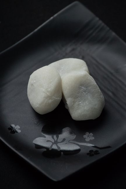 Mochi is a chewy Japanese rice cake made from pounded glutinous rice. What it is, how it's made, and its common forms.