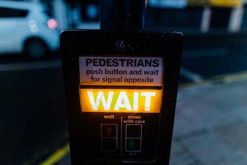 Yellow Wait Signage