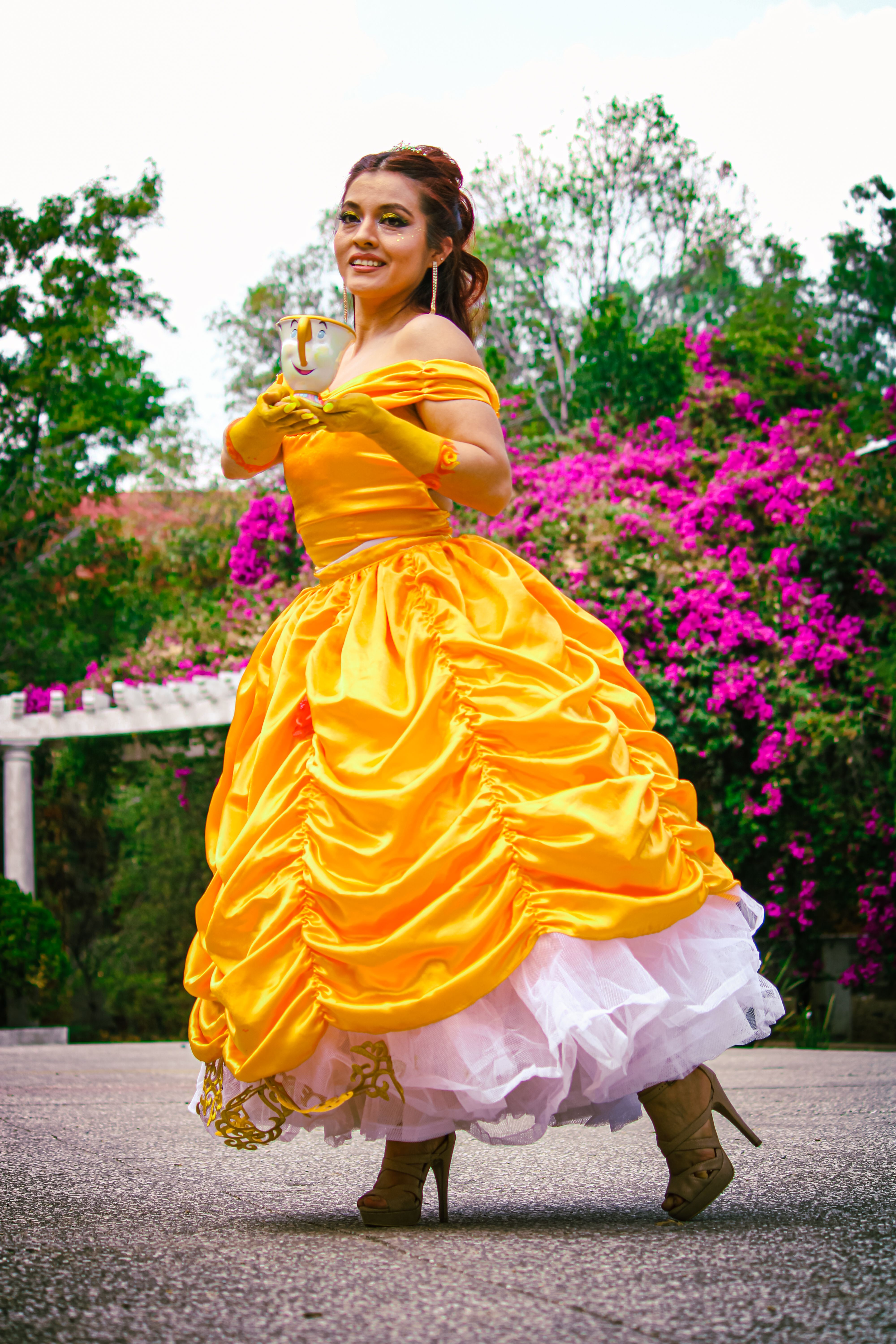 Princess Cosplay in a Vibrant Garden Setting  Free Stock Photo