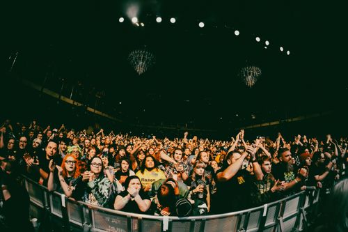 Free Lively audience enjoying a concert in Minneapolis, capturing the vibrant concert atmosphere. Stock Photo