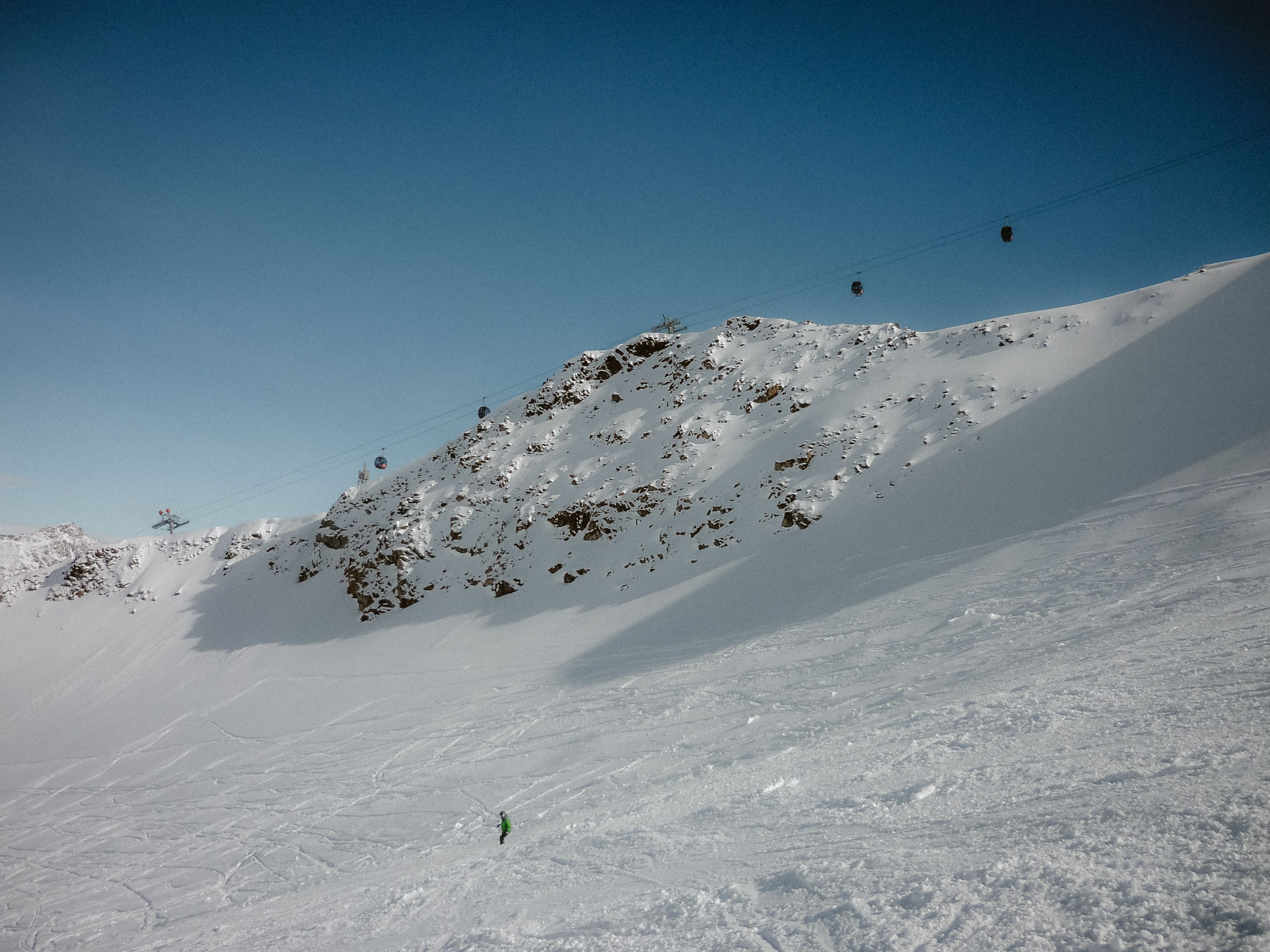 Snowy Mountain Landscape with Ski Lifts · Free Stock Photo