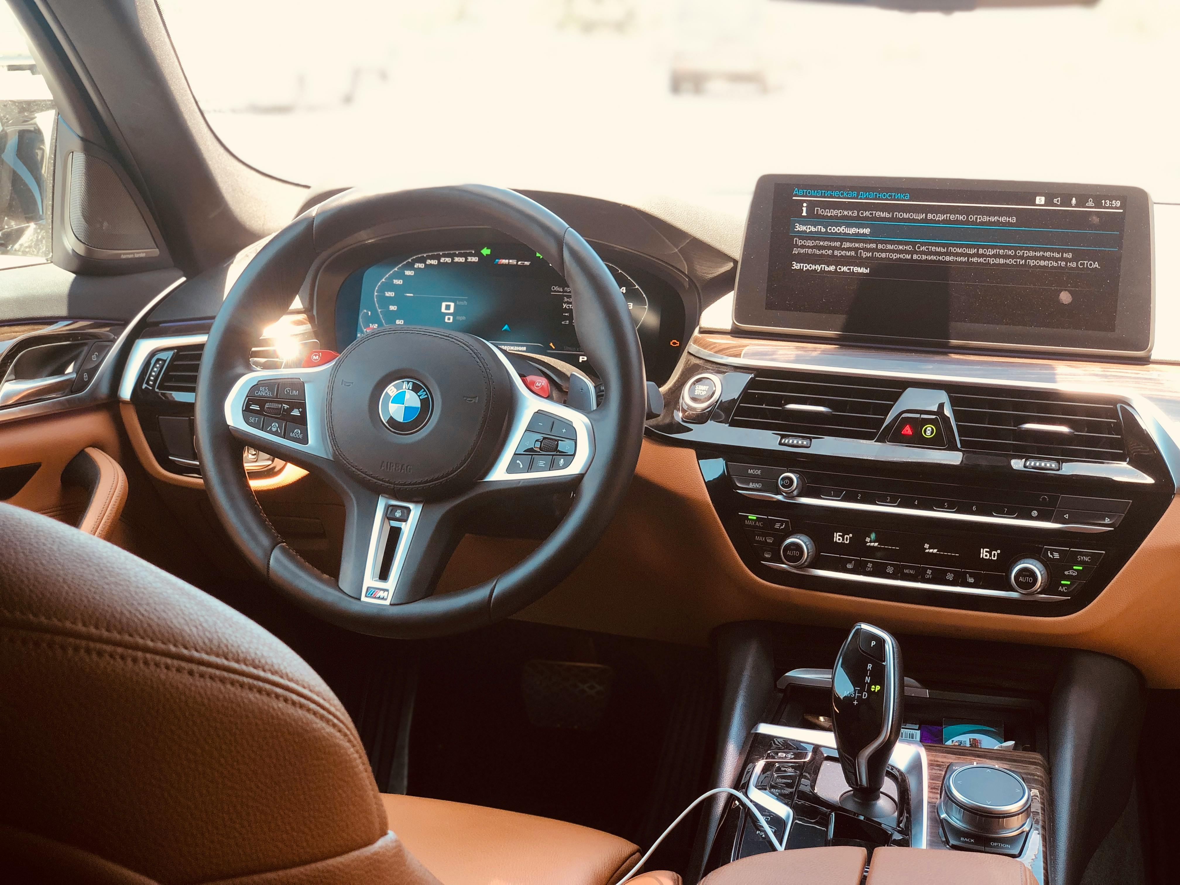 Explore a high-end car's interior with advanced technology and elegant design. Perfect for luxury and automotive themes.