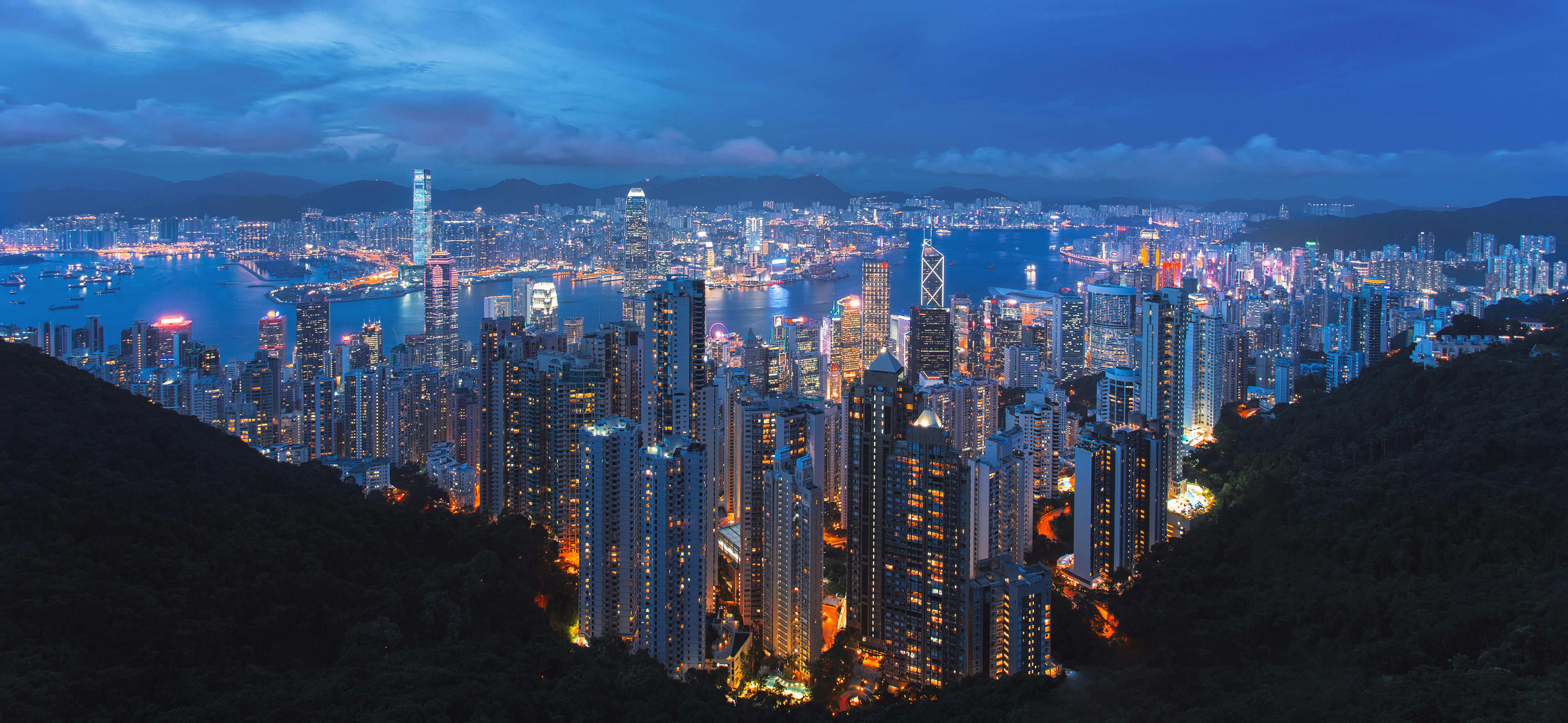 photo of lighted city buildings during nighttime