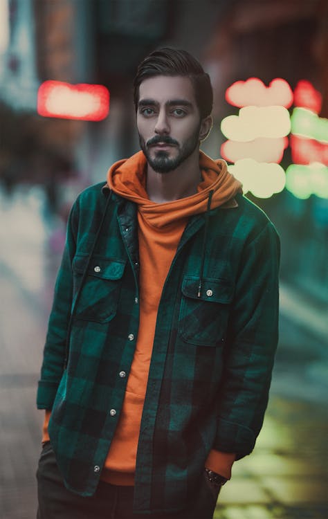 A man with freckled hair wearing an orange hoodie photo – Free Ahvaz/iran  Image on Unsplash