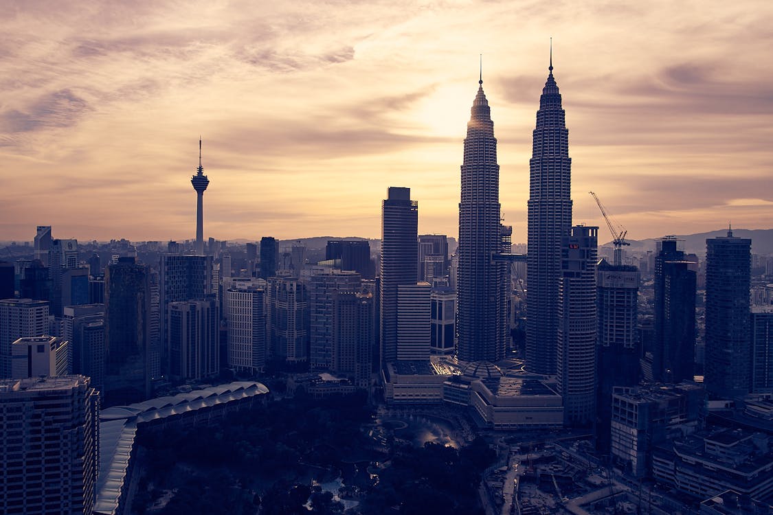 Free View of Cityscape Against Sky during Sunset Stock Photo