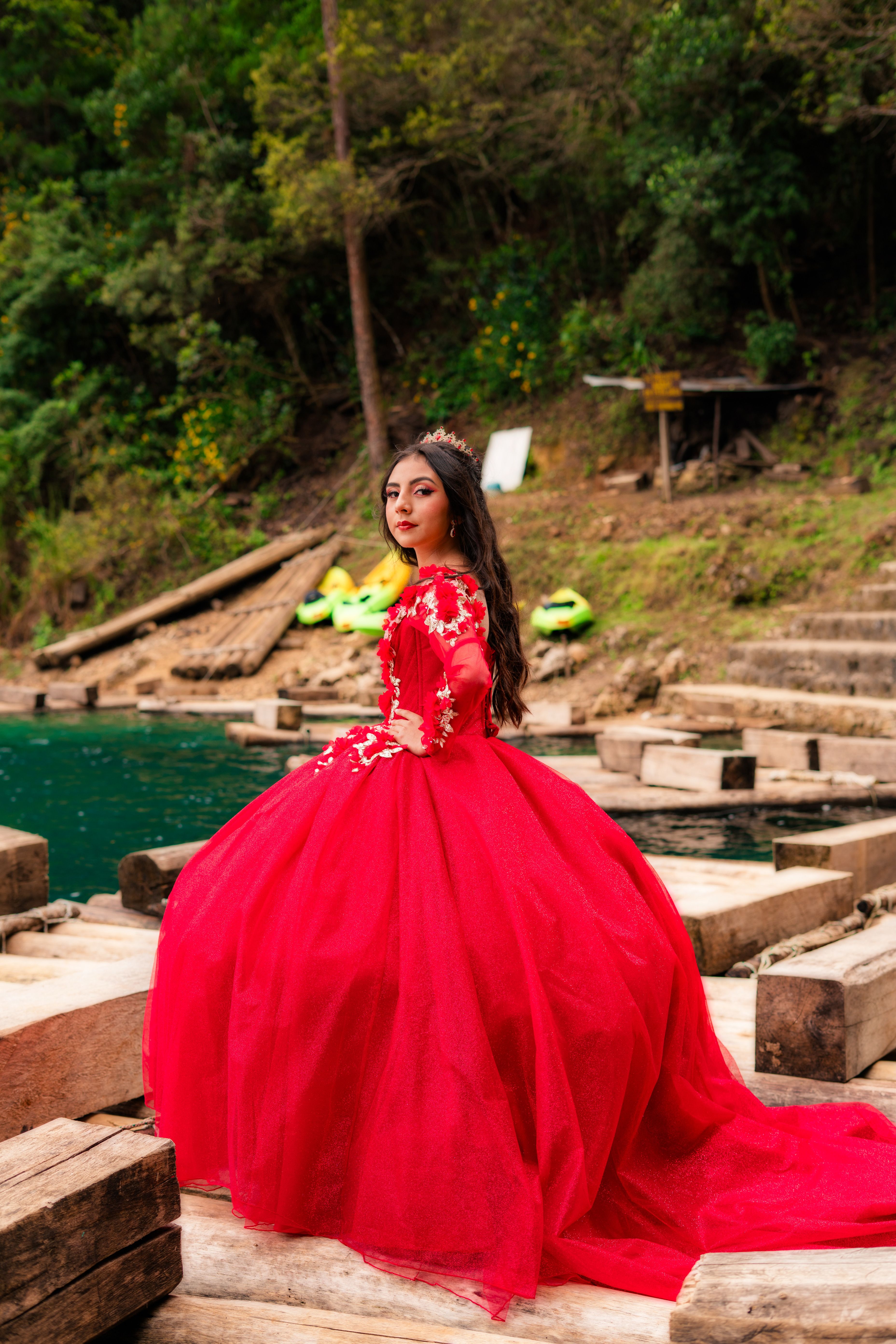 Elegant Portrait of Woman in Red Gown Outdoors · Free Stock Photo