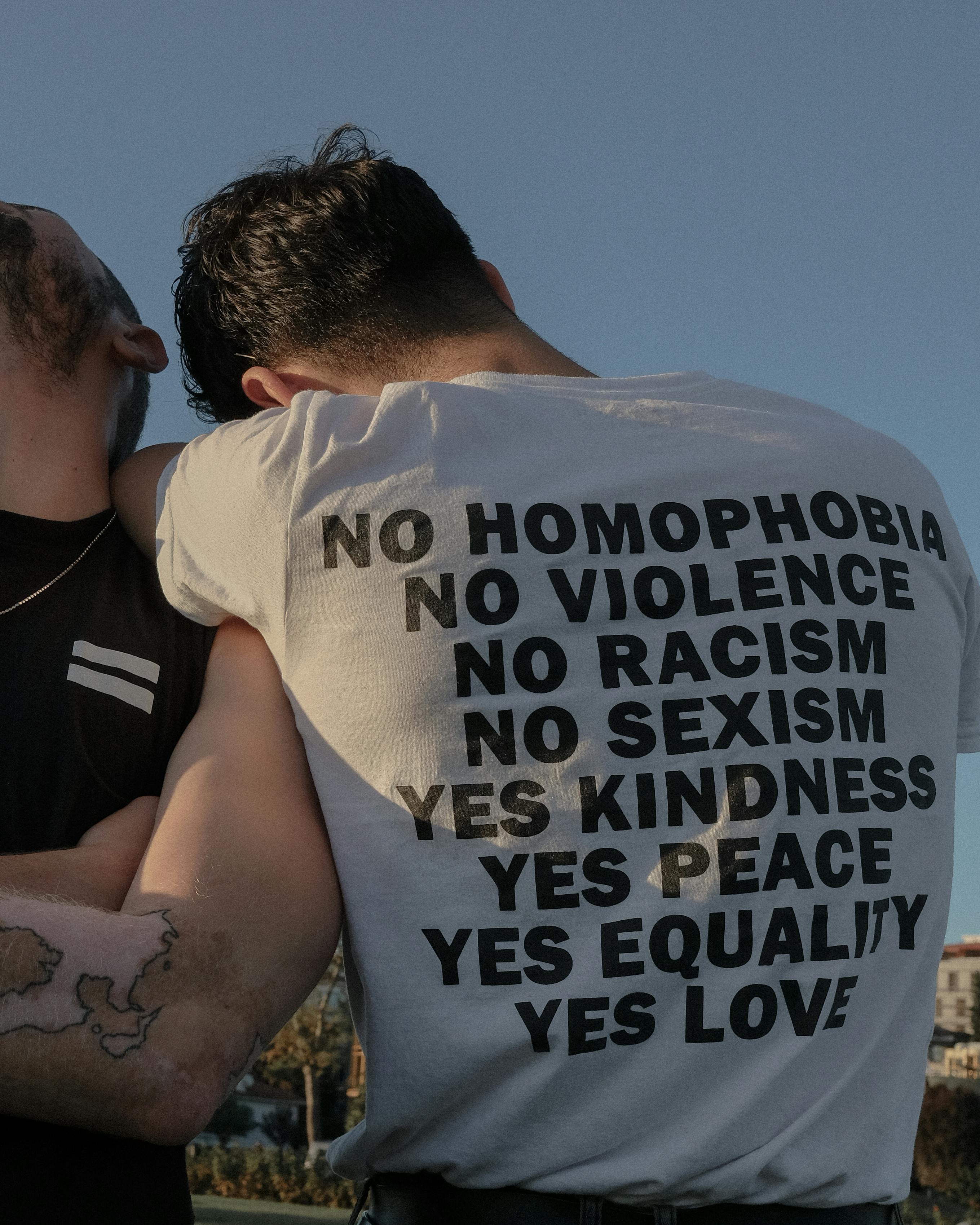 man wearing tshirt with equality slogans