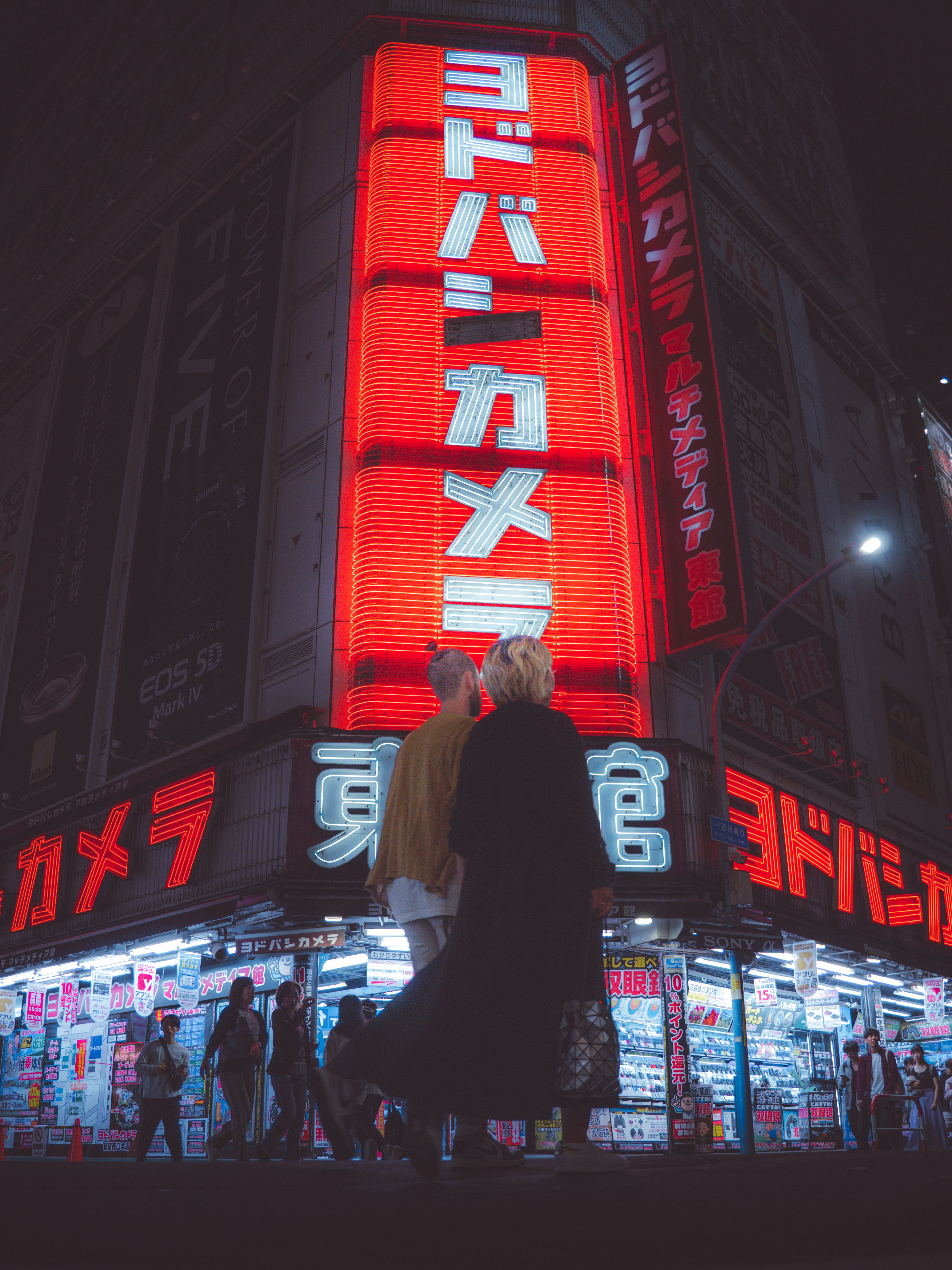 Nighttime Street Scene with Neon Signs in Tokyo · Free Stock Photo