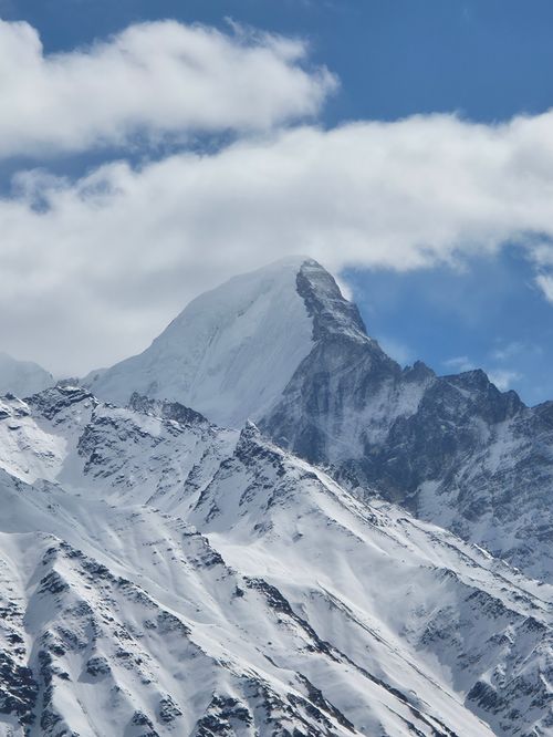 Free Magnificent snowy Himalayan mountains under a bright blue winter sky. Stock Photo