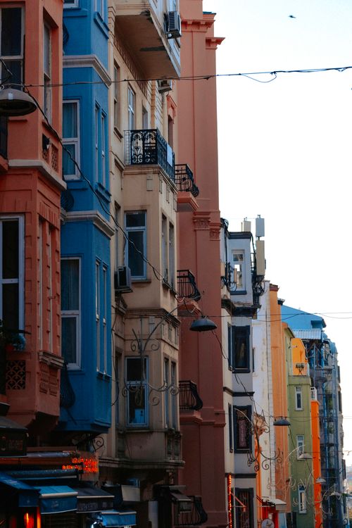 Free Colorful buildings line a vibrant street in İstanbul, Türkiye, capturing the essence of urban life. Stock Photo