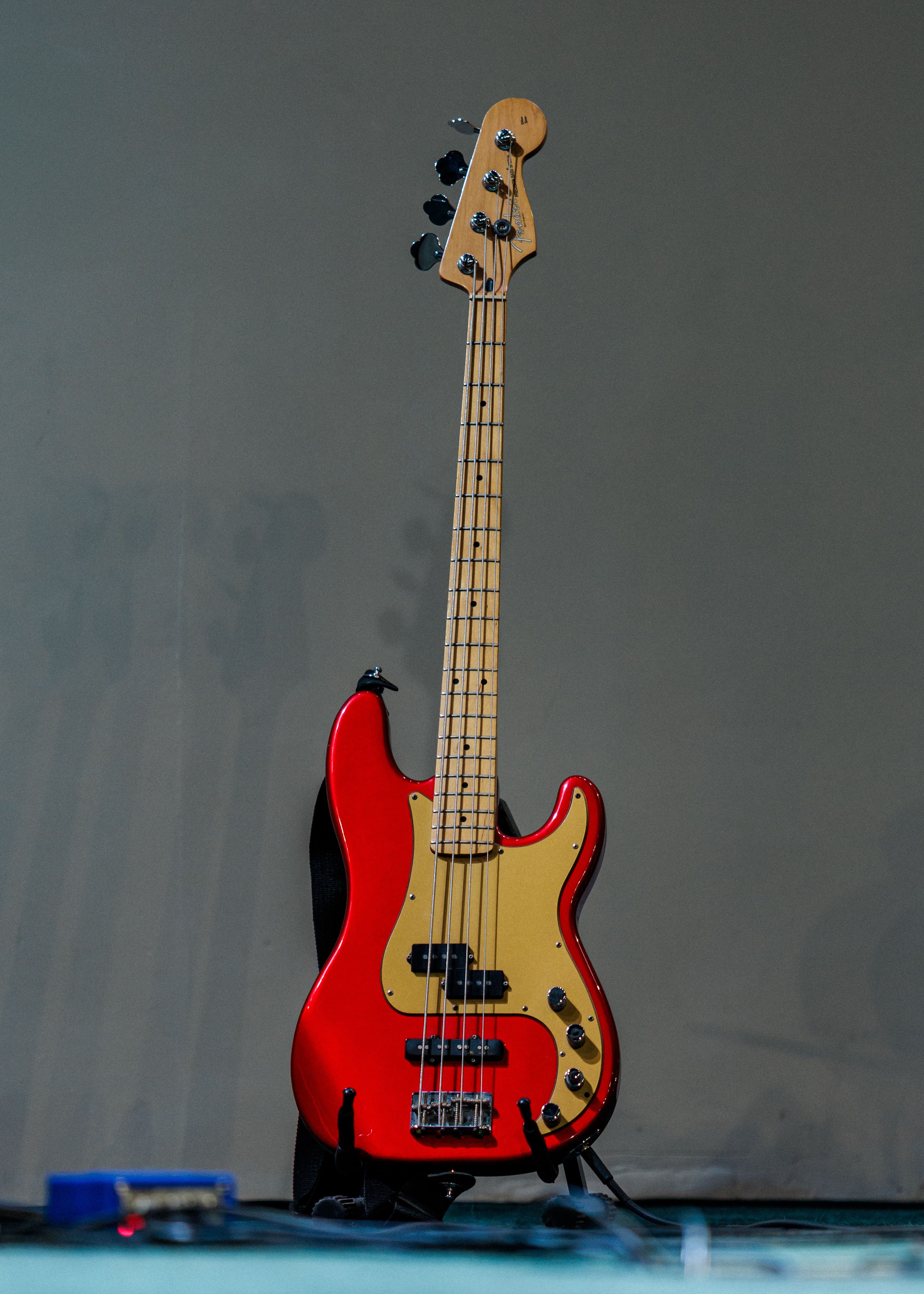 Classic Red Electric Bass Guitar on Stage