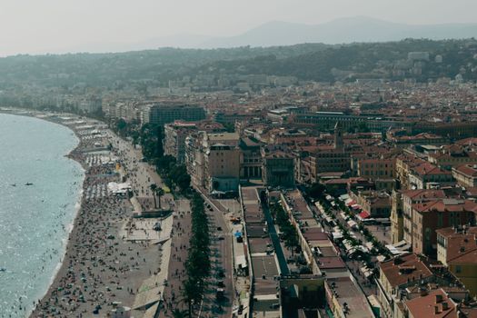 A stunning aerial view of Nice, France, showcasing the vibrant Promenade des Anglais along the Mediterranean Sea.