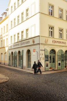 Beautiful street view in Görlitz, Germany, featuring Cambrinus Bierstuben and classic architecture.