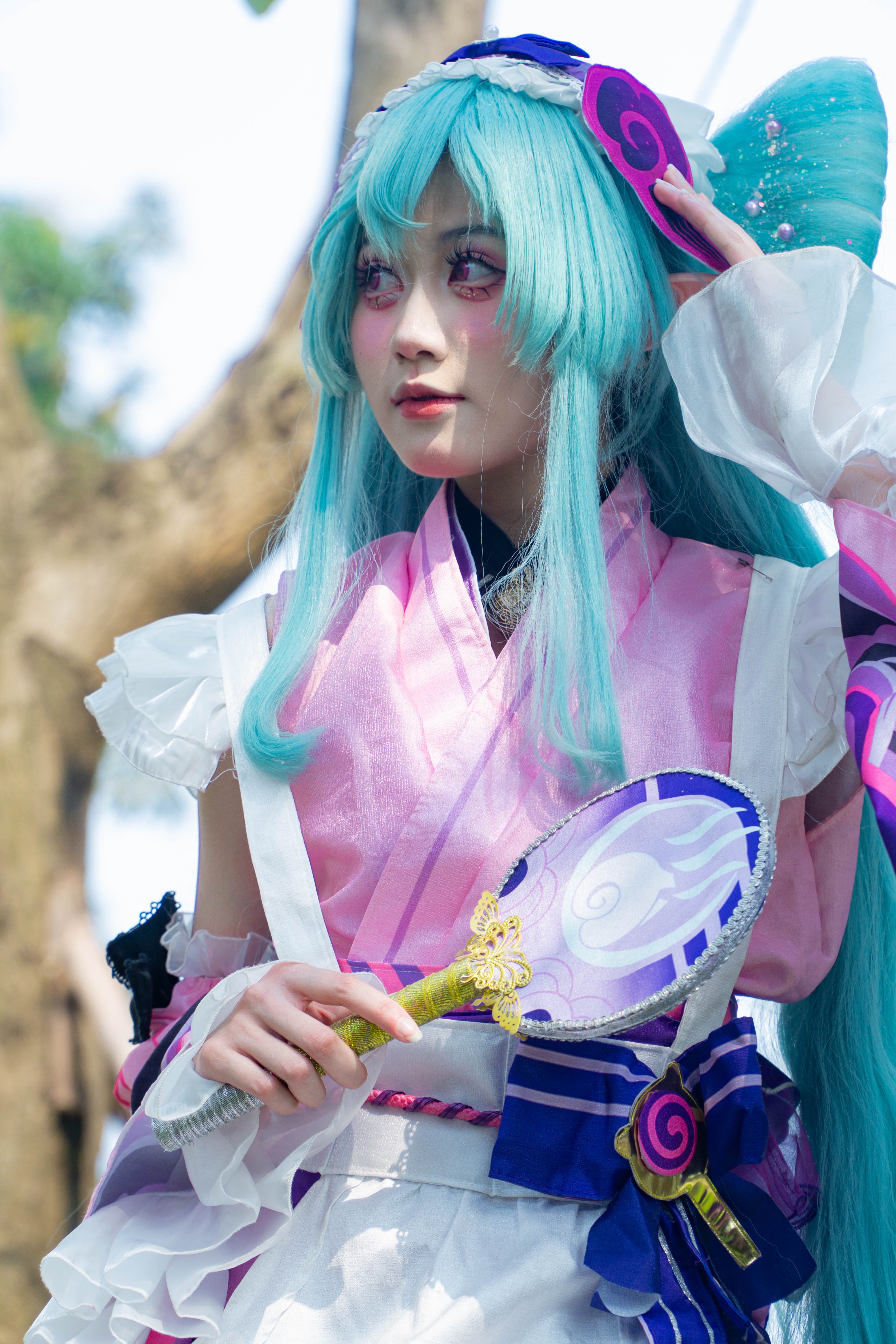 Vibrant Cosplay with Blue Hair and Traditional Outfit · Free Stock Photo