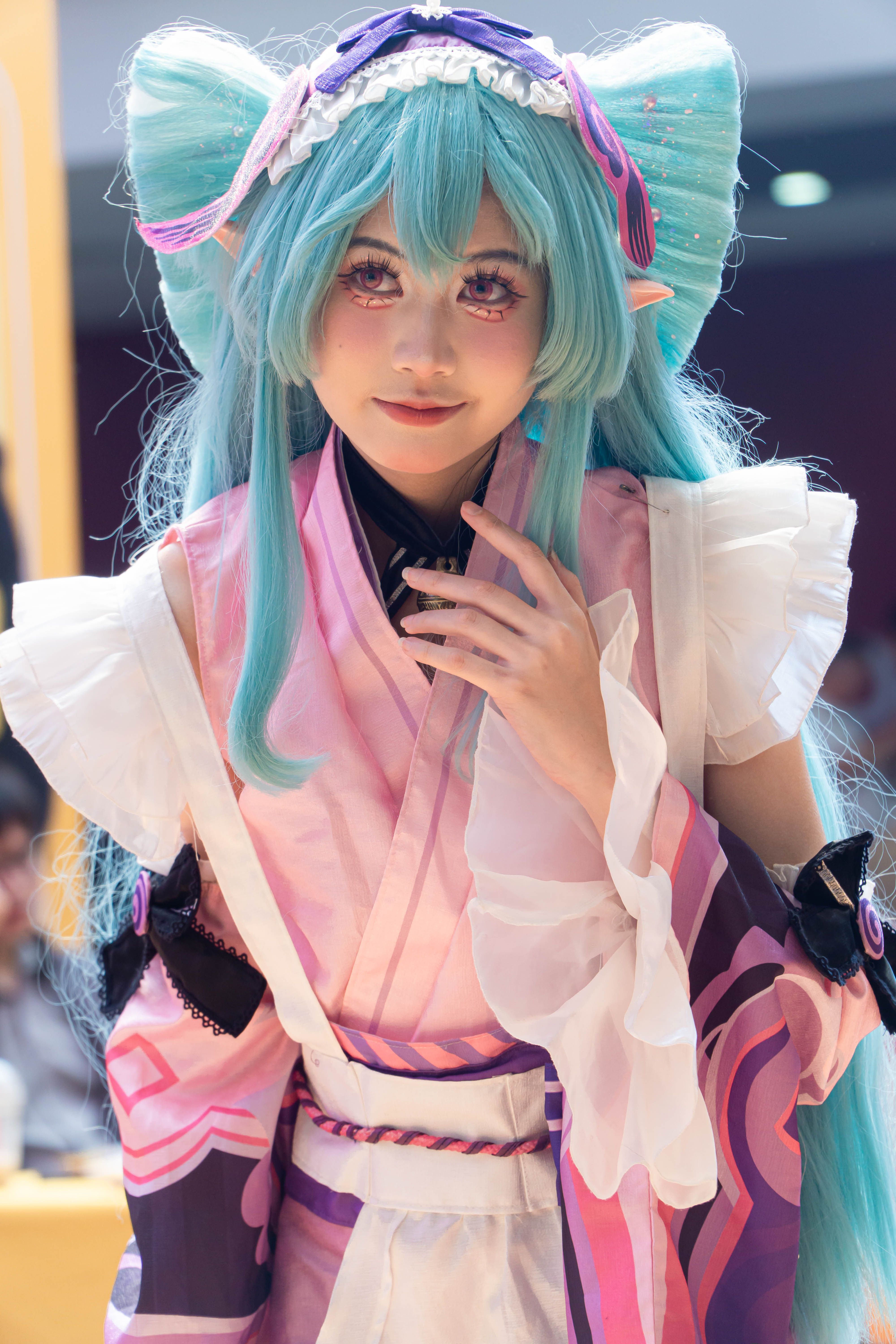 Colorful Anime Cosplay at Indoor Convention · Free Stock Photo