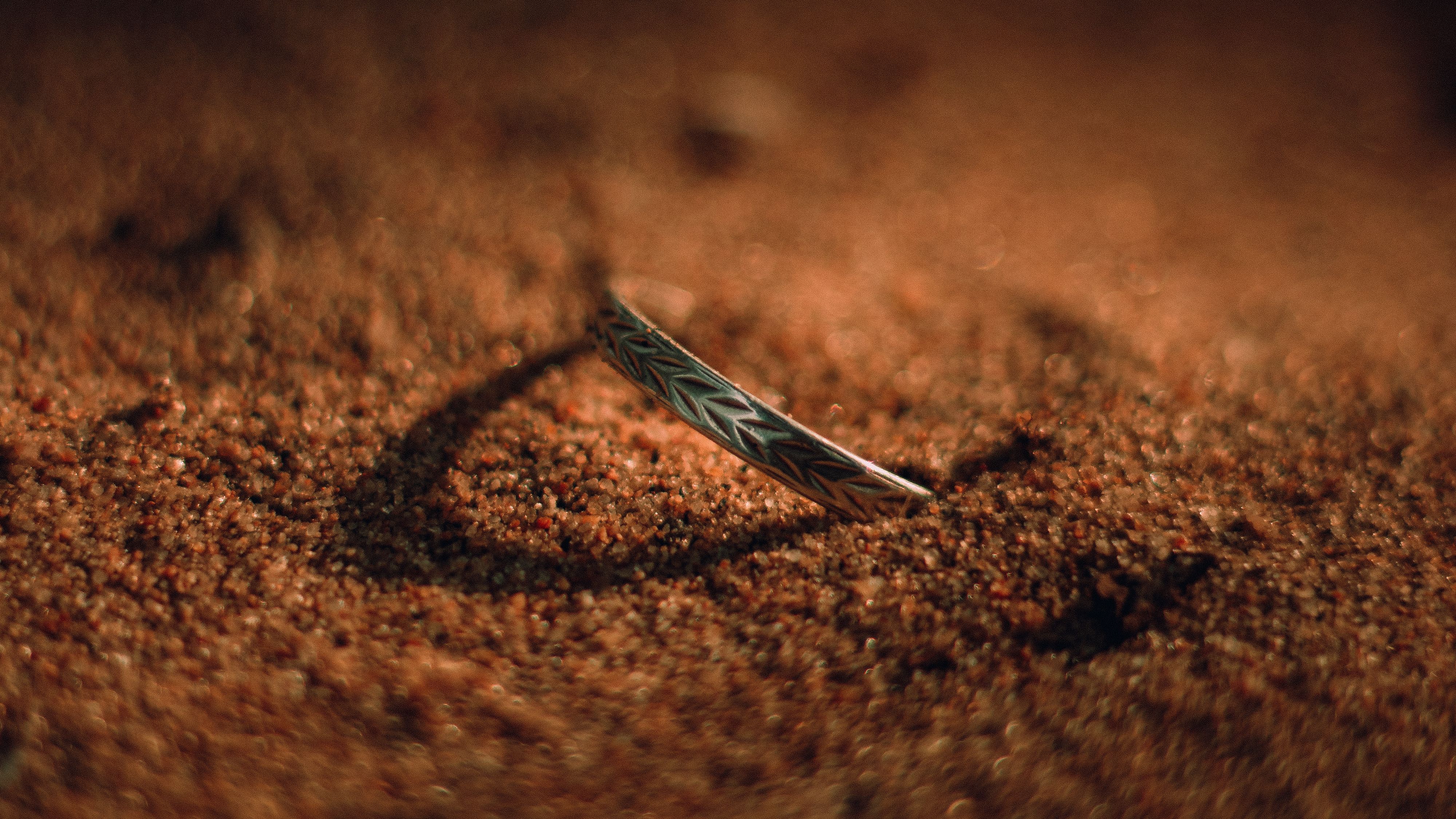 Sands of all kinds; natural, whether or not coloured, other than metal-bearing sands of chapter 26