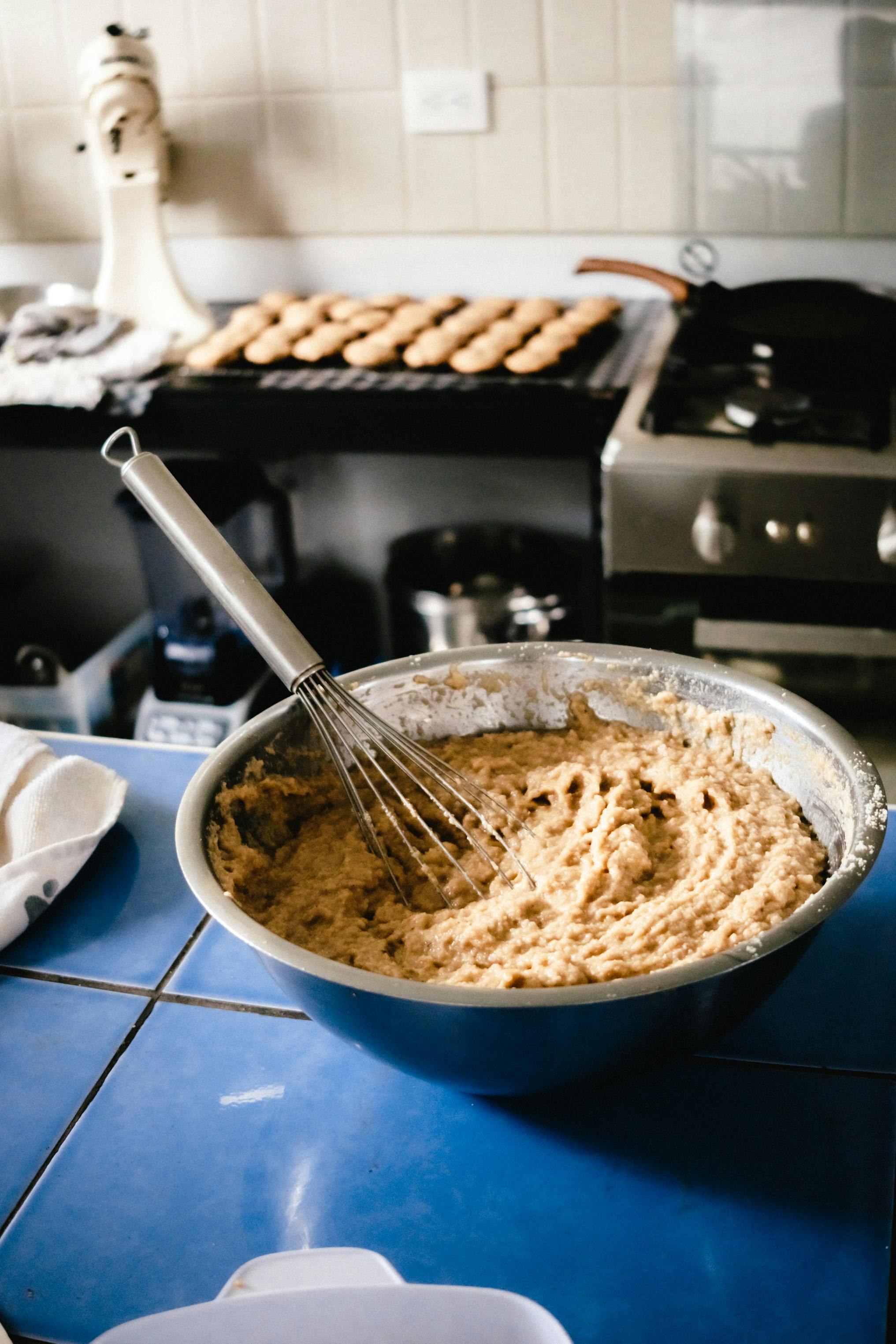 Bowl of dough with whisk in a cozy kitchen in Cholula, Mexico.