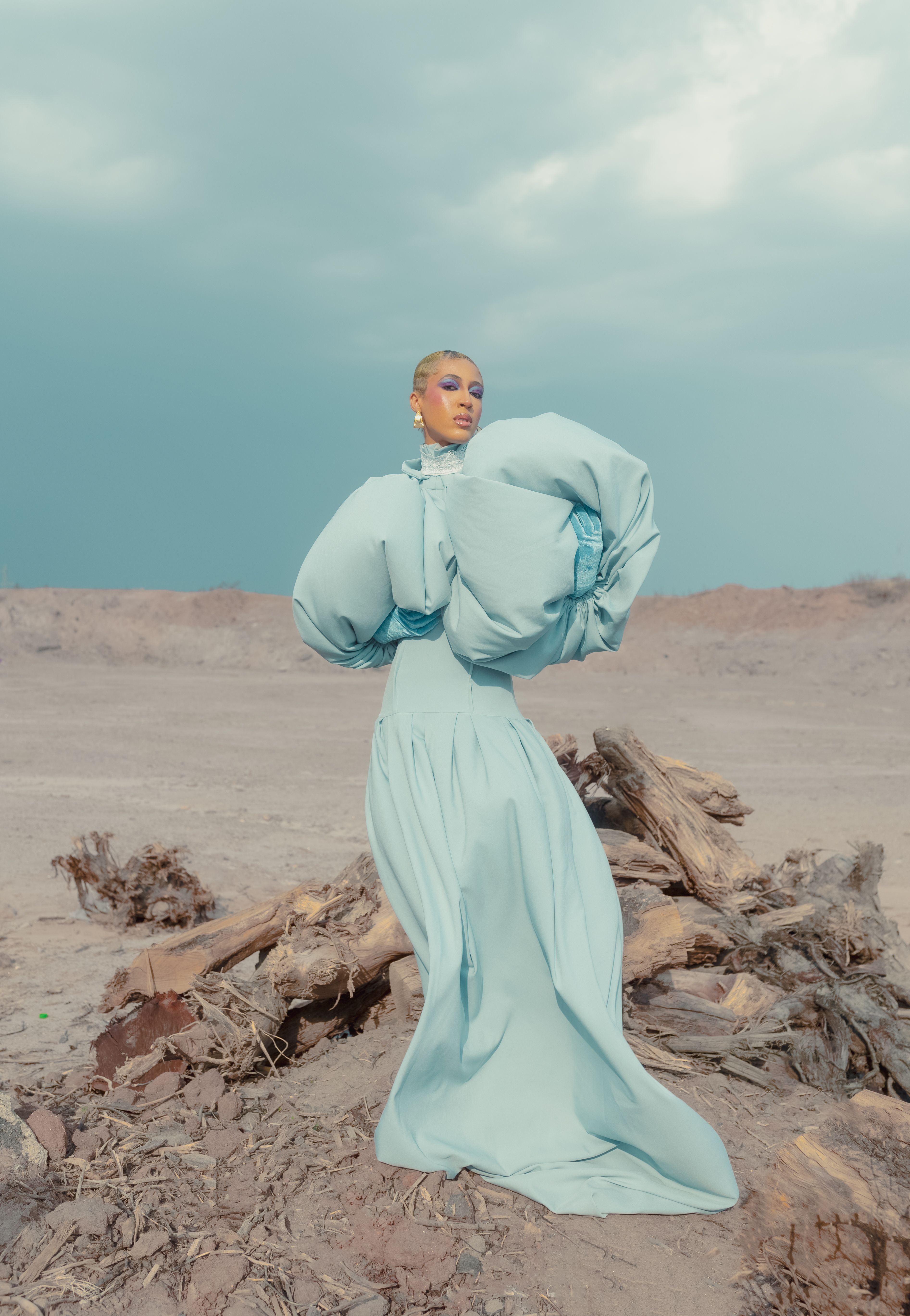 Futuristic Fashion in Desert Landscape  Free Stock Photo