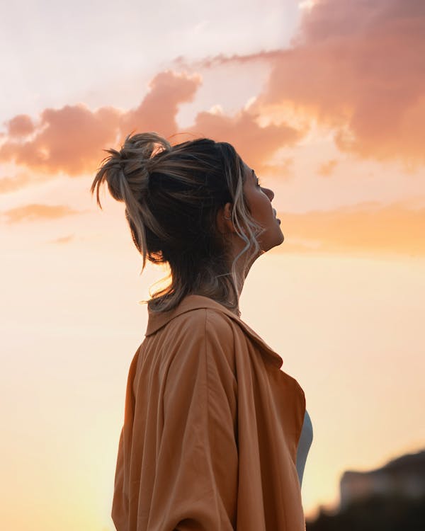 Free Woman Looking Towards the Sky Stock Photo