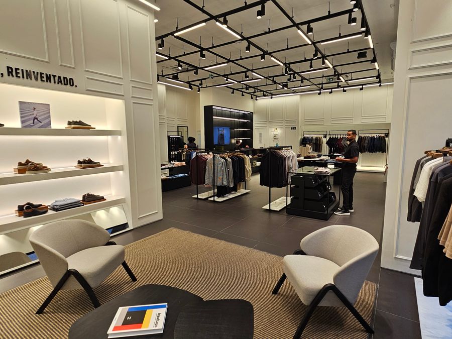 Retail showroom with display shelving and seating