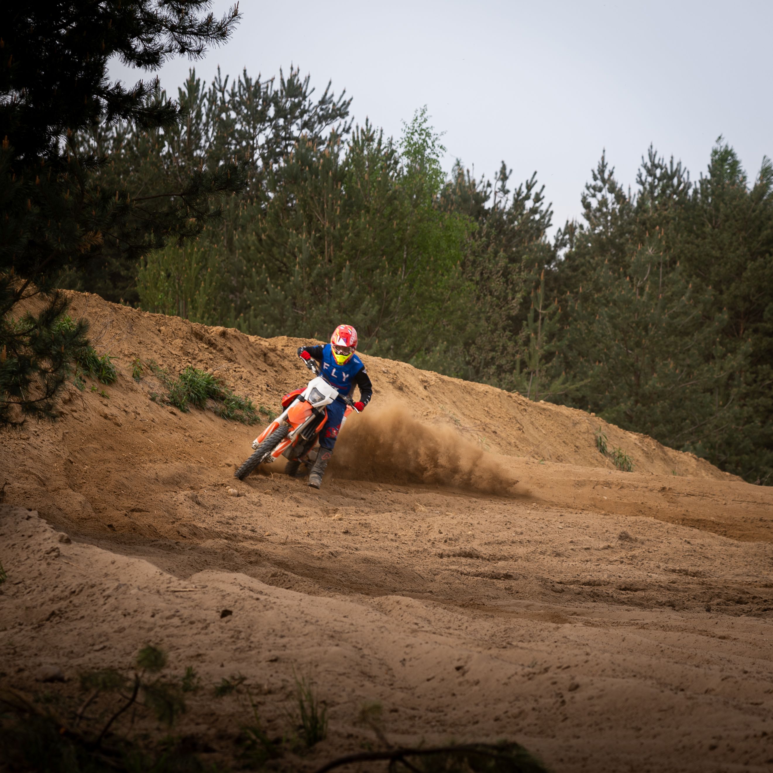 Motocross Rider in Action on Sandy Track · Free Stock Photo