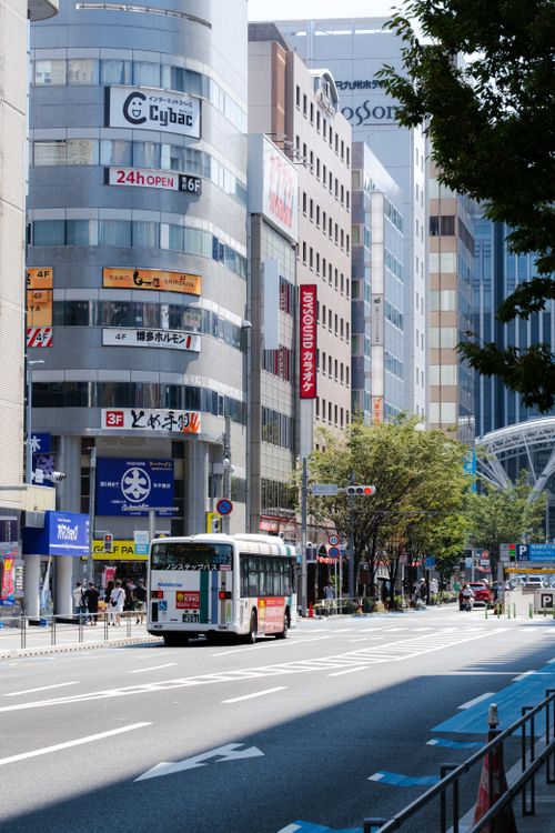 Free Discover the vibrant city life of Fukuoka with this dynamic street view capturing the essence of urban Japan. Stock Photo