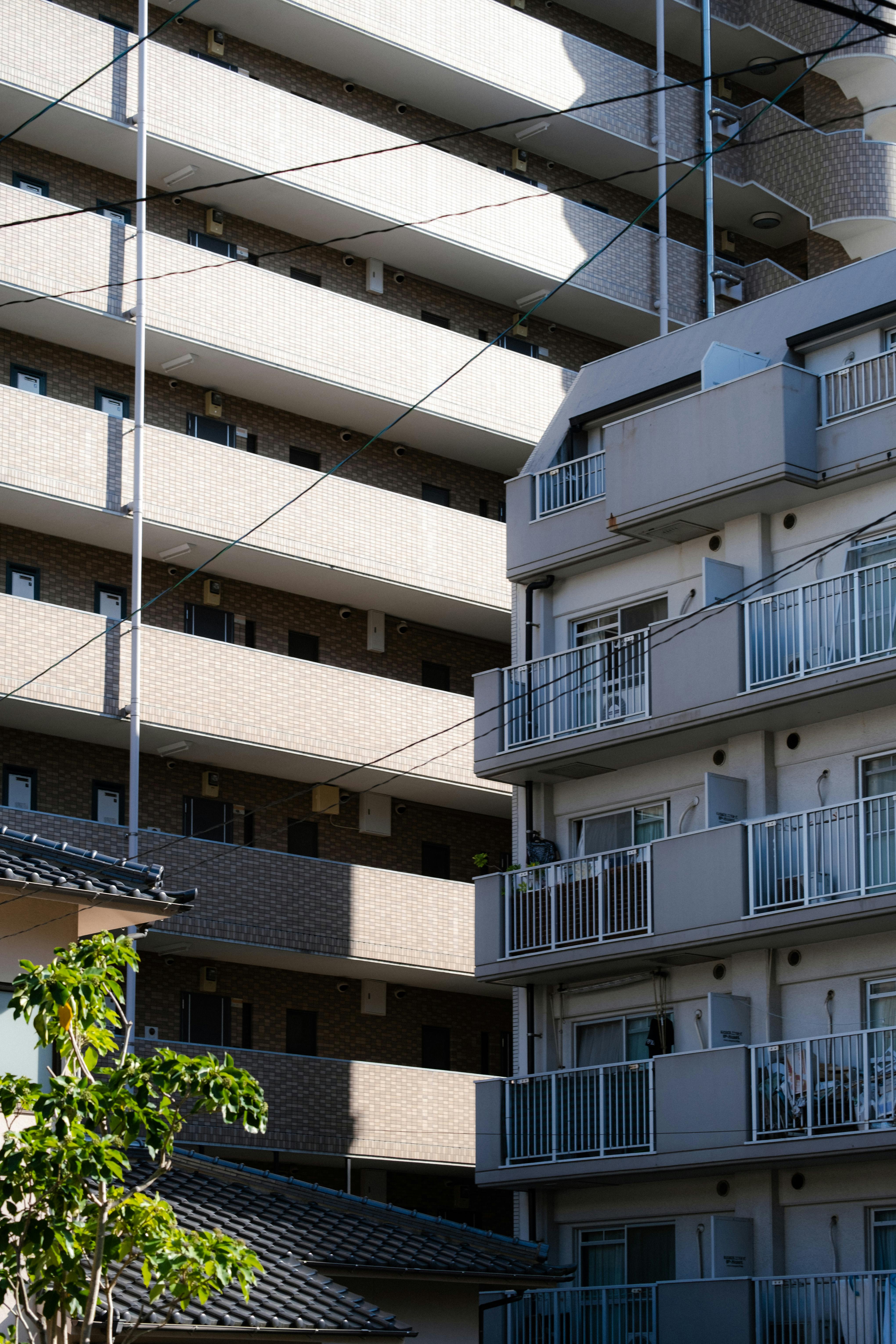High-rise residential buildings in Fukuoka, showcasing modern Japanese urban architecture.