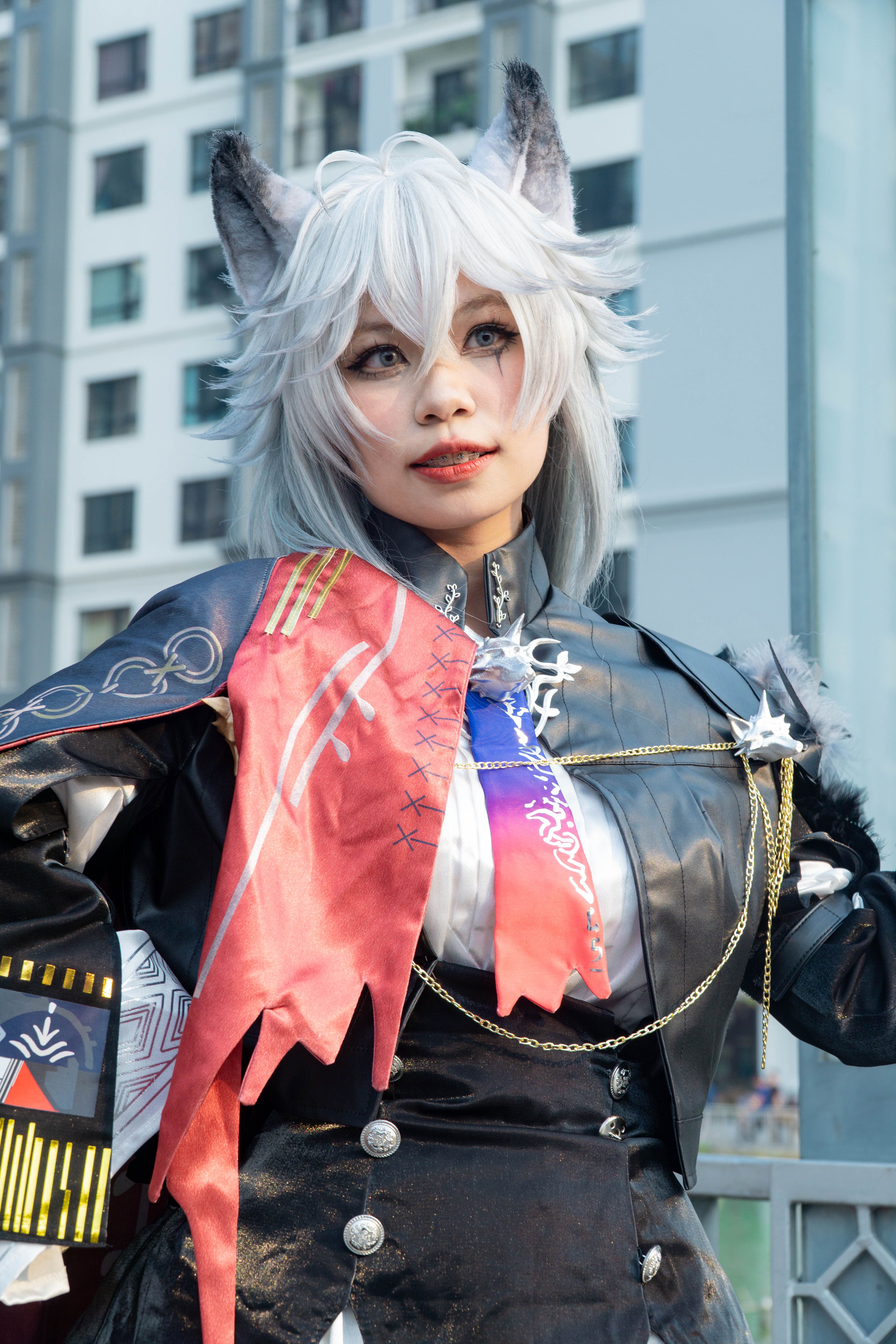 Creative cosplay photo showcasing detailed costume in a cityscape.