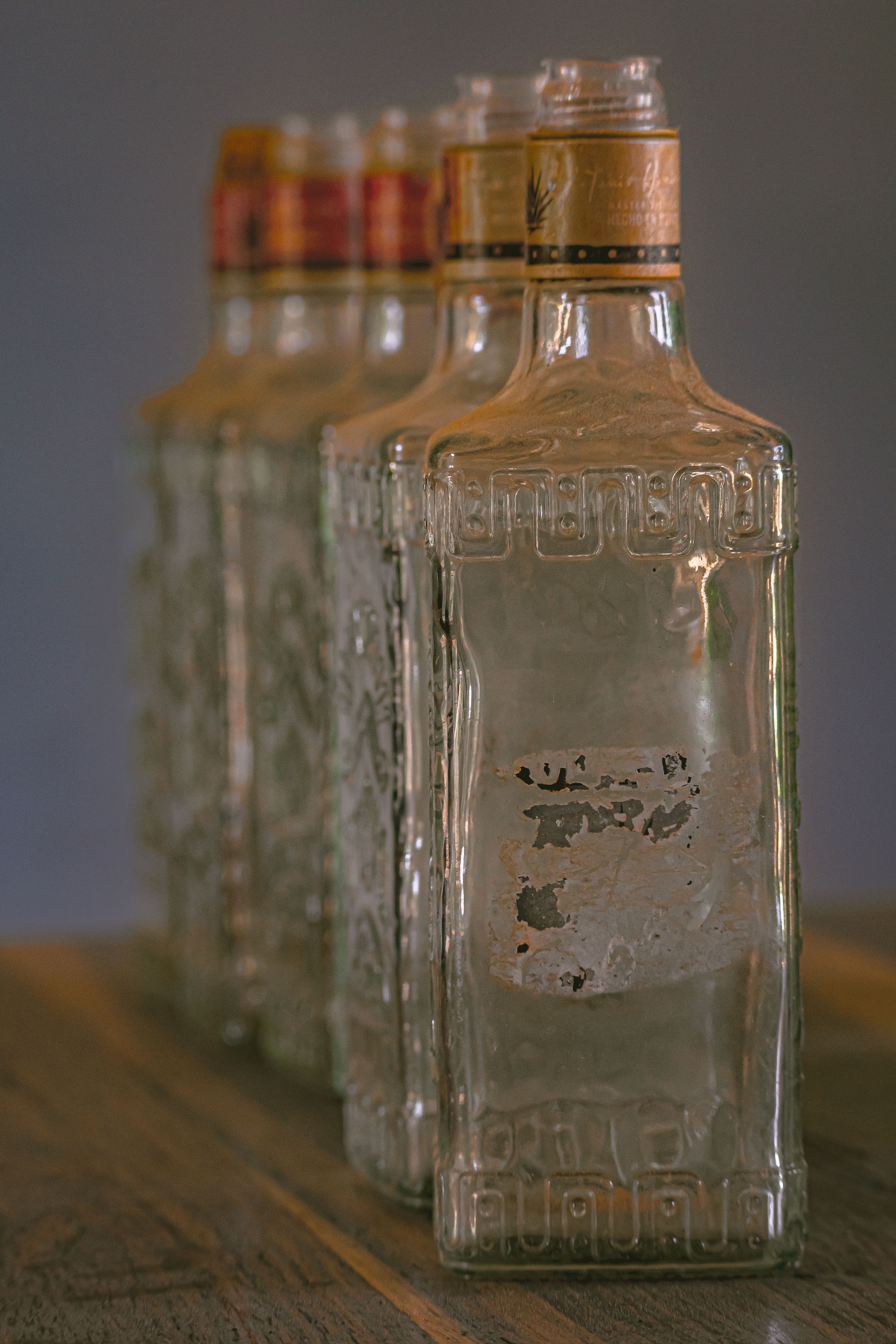 Vintage Glass Bottles with Rustic Charm · Free Stock Photo