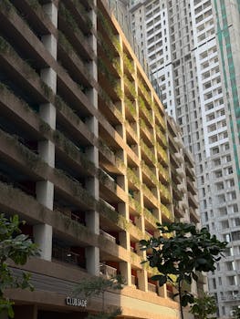 Urban architecture view of high-rise buildings in Mumbai suburb during daylight.