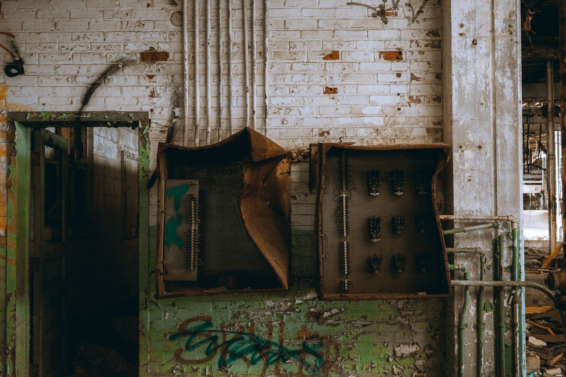 Explore the decayed charm of an abandoned industrial building with rusted elements and history.